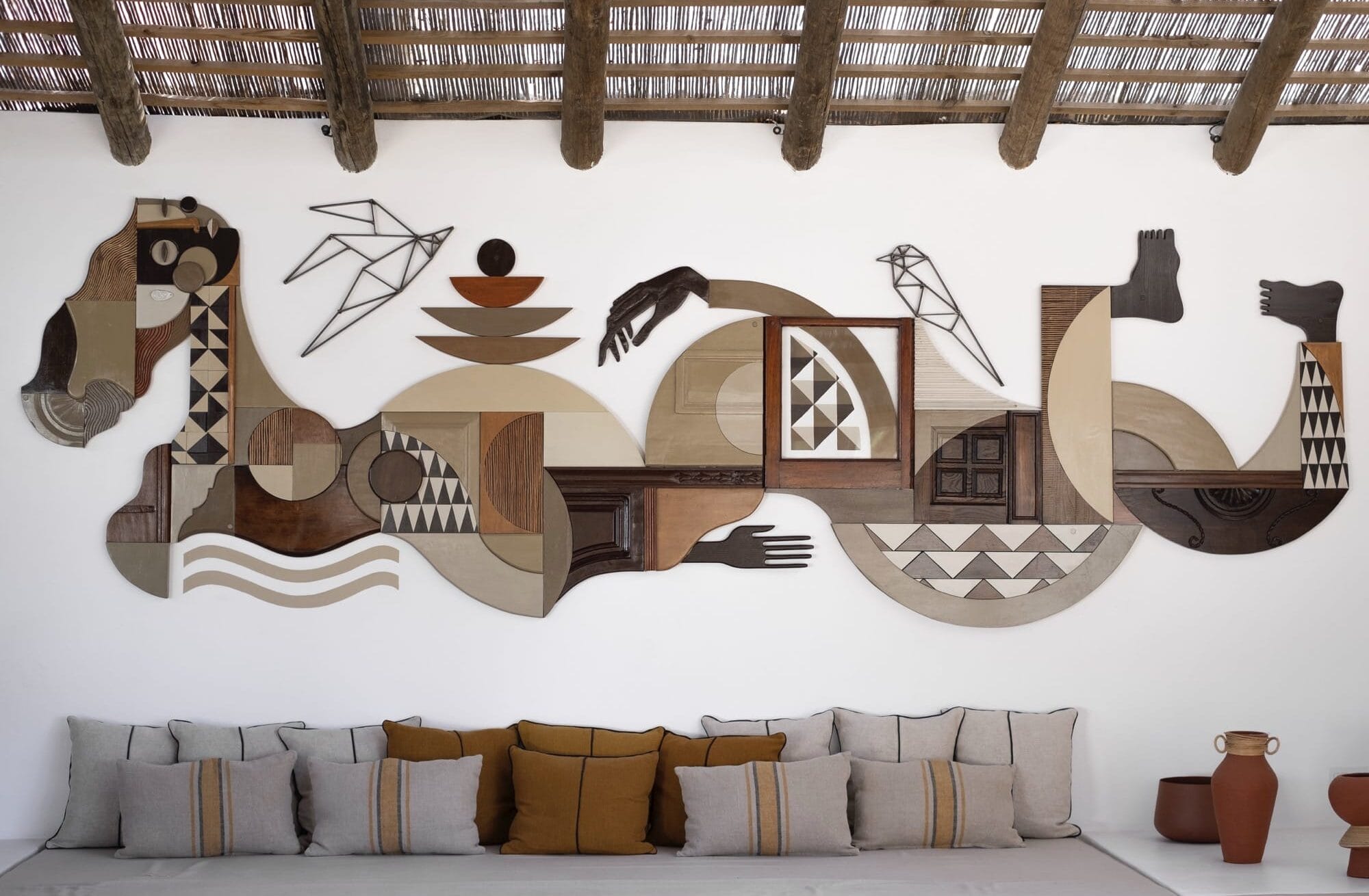 Wood and Ceramic ‘Guardian’ Assemblages by Expanded Eye Emphasize Earthy Materials