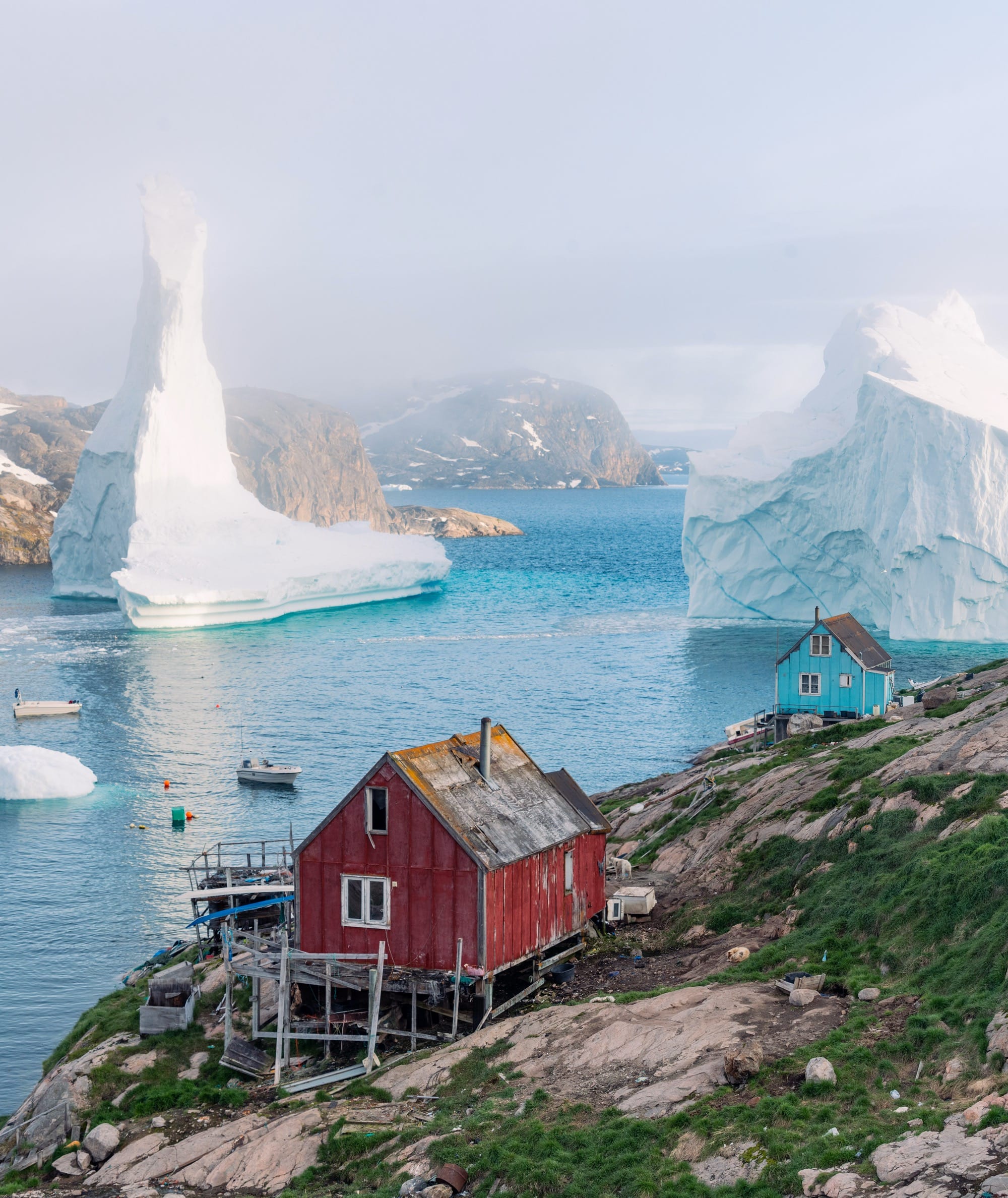 Dennis Lehtonen Documents a Pair of Immense Icebergs Paying a Visit to a Small Greenland Village