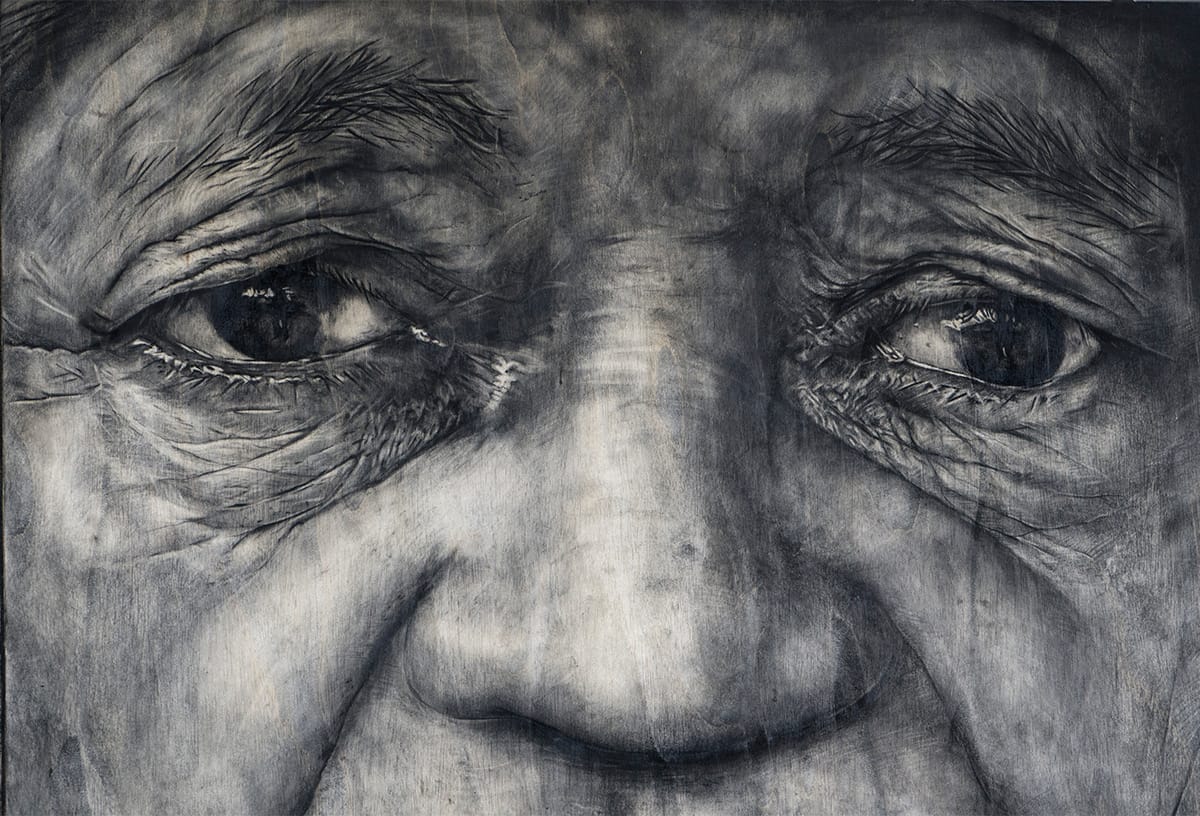 a close up of a portrait in grayscale