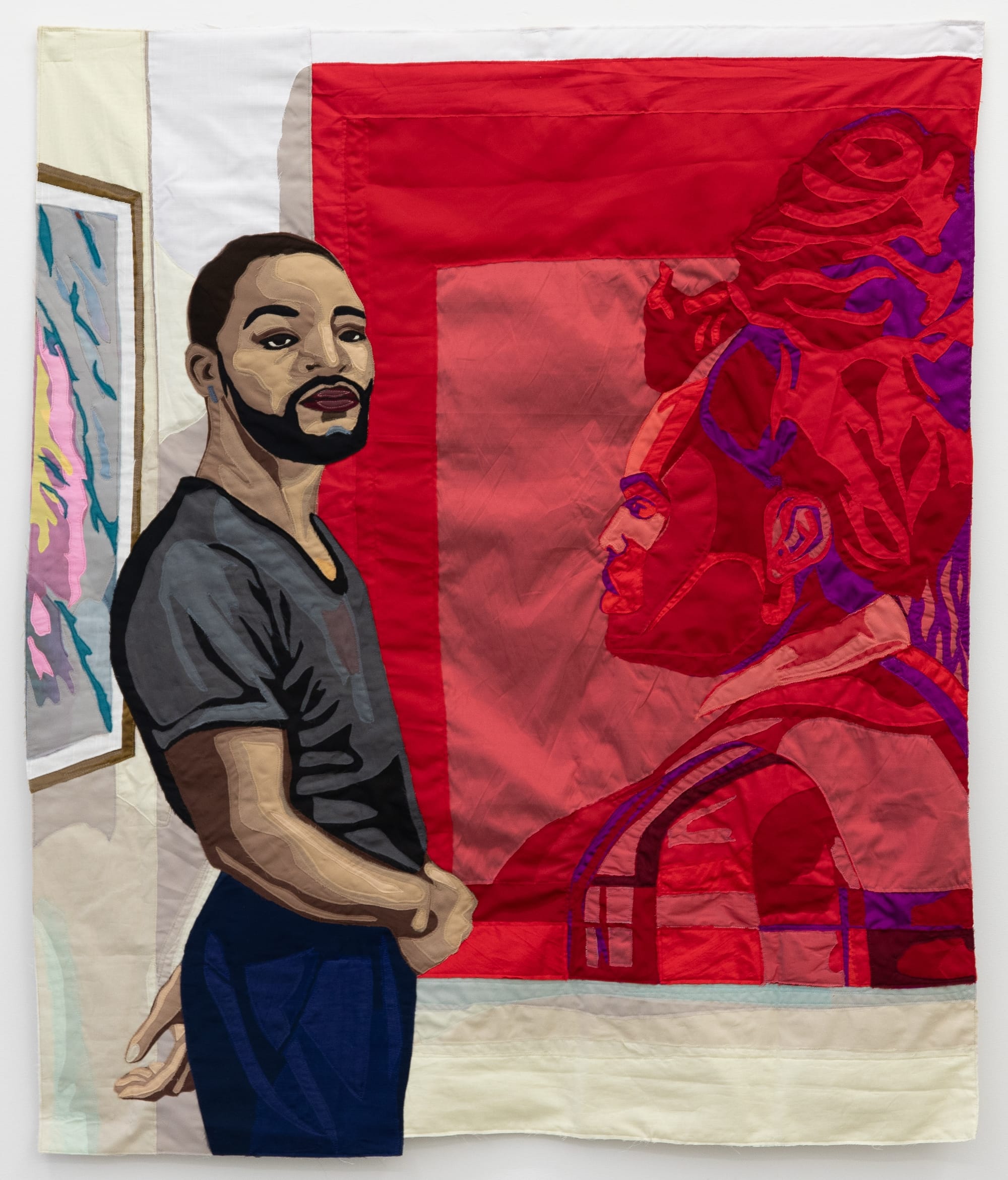 a quilt by Hangama Amiri of a Black man standing in front of a red portrait of a woman