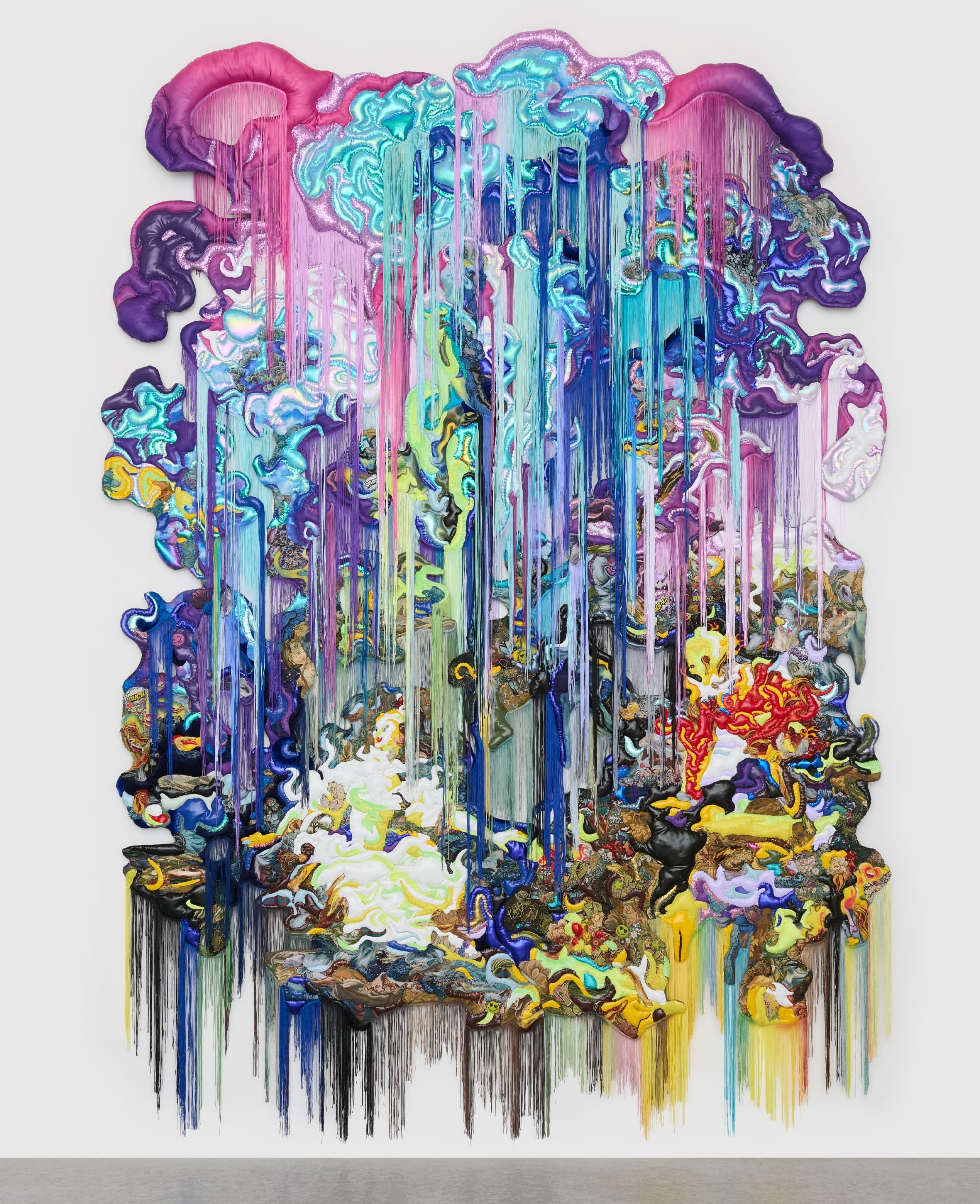 a monumental, abstract wall installation by Anne von Freyburg that appears to be cascading in purple, teal, and pink hues